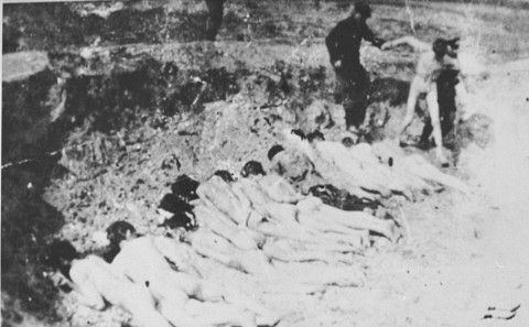 A naked prisoner is led to an execution site in the Stutthof concentration camp 2